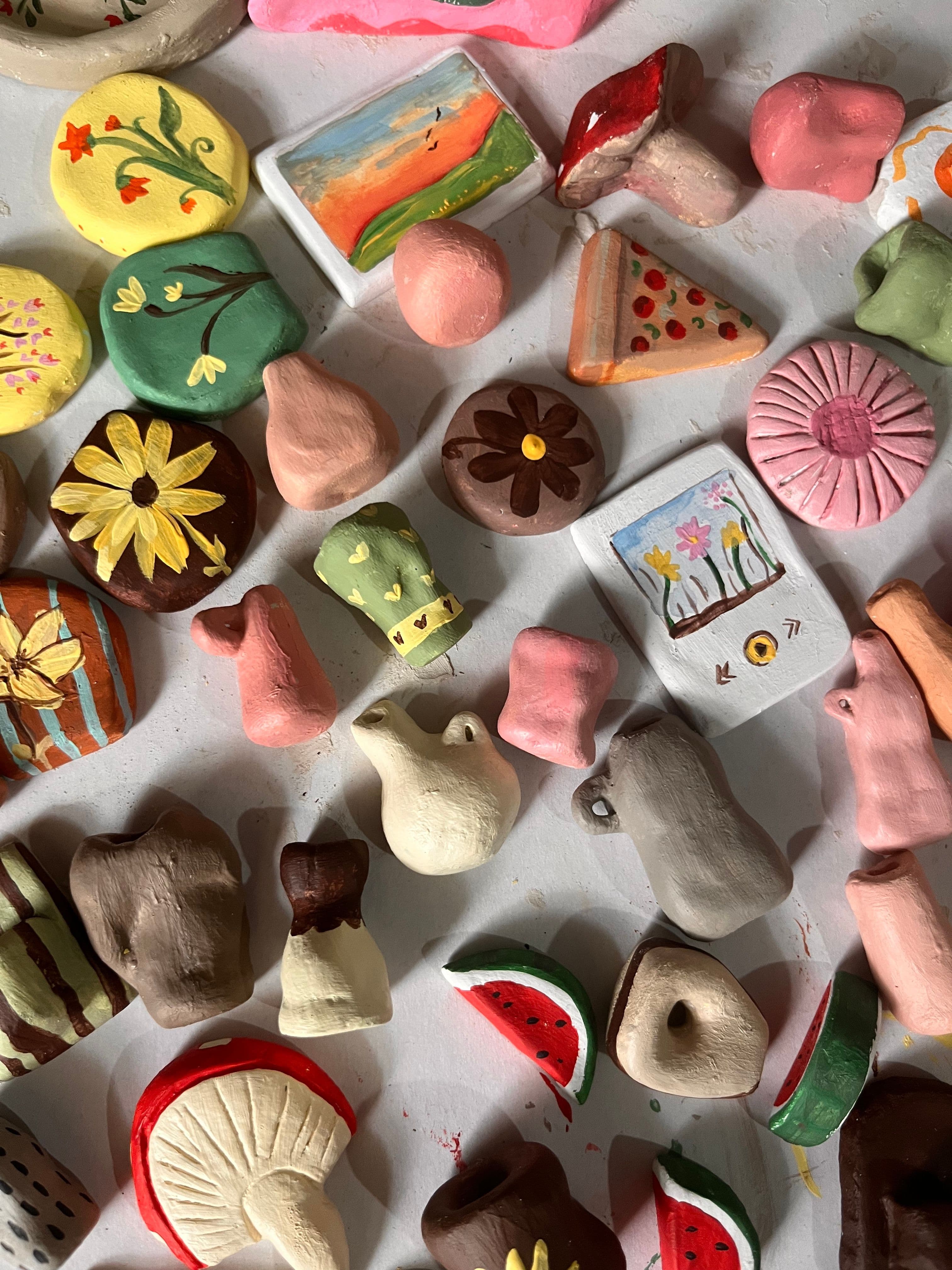 Craft papers, tools and DIY materials arranged on a worktable